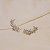 Brinco ear cuff flores zircônia ródio semijoia 26k06022 - Imagem 8