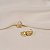 Brinco argolinha gota zircônia ouro semijoia 25k05009 - Imagem 2