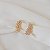 Brinco ear cuff folha zircônia ouro semijoia 25k08008 - Imagem 1