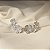 Brinco ear cuff flores zircônia ródio semijoia 26k03011 - Imagem 1