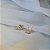 Brinco estrela zircônia ouro semijoia 26k08009 - Imagem 2
