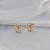 Brinco chuveiro zircônias ouro semijoia 26k08050 - Imagem 3