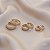 Kit 3 brincos argolinhas texturizadas ouro semijoia 24k02003 - Imagem 1
