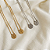 Kit com 2 colares escapulários São Bento ouro e ródio aço inox - Imagem 1
