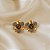 Brinco Morena Canela hibisco m strass black diamond ouro semijoia - Imagem 1