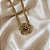Colar Morena Canela hibisco g strass black diamond ouro semijoia - Imagem 1