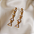 Brinco Palone Design estrelas cristais ouro vintage - Imagem 1