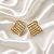 Brinco Losango com Zircônias Baguete Dourado Semijoia - Imagem 3