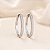 Brinco argola oval zircônia ródio semijoia 18k07020 - Imagem 1