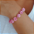Pulseira  bolas de miçangas rosa - Imagem 1