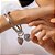 Pulseira duas argolas e pingente smile - Imagem 1