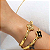 Bracelete articulado com detalhe de trevo sem resina com strass folheado em ouro  ( serve até pulso 18 cm) - Imagem 2
