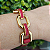 Pulseira Dourada Lily com placa resina e couro vermelho folheado em ouro (EDIÇÃO LIMITADA) - Imagem 1