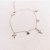 Pulseira Cruz e Pontos de Luz - Imagem 1