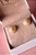 Brinco botom cravejado com pino central - Imagem 2