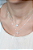 Colar com cruz cravejada - Imagem 1