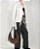 SCHUTZ BOLSA HOBO AURA COURO ONÇA - Imagem 1