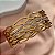 BRACELETE ONDULADAS VAZADAS DETALHE ZIRCÔNIAS DOURADO AÇO 316L PREMIUM⭐️ - Imagem 1