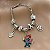 PULSEIRA BERLOQUES VARIADOS INFANTIL STITCH BIJU - Imagem 4
