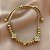 PULSEIRA PINGENTES BOLINHAS E TREVOS MINI ZIRCÔNIAS FECHO GRAVATA DOURADO AÇO 316L⭐️ - Imagem 2