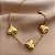 PULSEIRA PINGENTES CORAÇÕES LISOS GRANDES DOURADO AÇO 316L⭐️ - Imagem 1