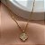 COLAR PINGENTE TREVO ZIRCÔNIAS DOURADO AÇO 316L⭐️ - Imagem 1