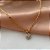 COLAR PINGENTE MINI CÍRCULO ZIRCÔNIAS DOURADO AÇO 316L⭐️ - Imagem 1