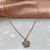 COLAR PINGENTE FLOR ZIRCÔNIAS DOURADO AÇO 316L⭐️ - Imagem 1