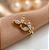 PIERCING FAKE BORBOLETAS ZIRCÔNIAS DOURADO AÇO 316L⭐️ - Imagem 1