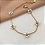 PULSEIRA FLORZINHA DE PÉROLAS DOURADO AÇO 316L⭐️ - Imagem 2