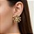 BRINCO FLOR PÉTALAS FINAS G COM PEDRA ZIRCÔNIA DOURADO AÇO 316L⭐️ - Imagem 2