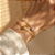 PULSEIRA CORRENTE DUPLA CORAÇÕES E ZIRCÔNIAS DOURADO AÇO 316L⭐️ - Imagem 2