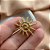 BROCHE SOL TEXTURIZADO DOURADO AÇO 316L⭐️ - Imagem 2