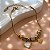 PULSEIRA PINGENTES CORAÇÃO MADREPÉROLA E ZIRCÔNIAS DOURADO AÇO 316L⭐️ - Imagem 2