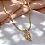 COLAR FITA PINGENTE PENA COM ZIRCÔNIAS DOURADO AÇO 316L⭐️ - Imagem 1