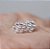 Brinco moissanite florzinha 3mm 0.1ct prata legítima 925 - Imagem 4