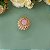Anel dourado cravejado com zircônias e cristal quartzo rosa - Imagem 1