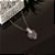 Colar ródio branco com pingente de coração transparente - Imagem 2