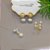 Anel de pérolas shell e zircônias - Imagem 3