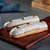 Éclair de Creme de Maracujá com Chocolate Branco - 2 unidades - Imagem 1