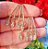 BRINCO EAR HOOK INSPIRED COM ZIRCONIAS BANHADO A OURO 18 K - Imagem 3
