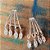 BRINCO EAR HOOK INSPIRED COM ZIRCONIAS BANHADO A OURO 18 K - Imagem 2