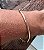 PULSEIRA TUBULAR COM PINGENTES DE CORAÇAO BANHADA A OURO 18 K - Imagem 3