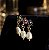 BRINCO EAR CUFF FLORES E PEROLAS BANHADO A OURO 18 K - Imagem 1