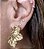 BRINCO FLOR P BANHADO A OURO 18 K - Imagem 1