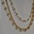COLAR CHOKER TRIPLO PEROLAS E BOLINHAS BANHADO A OURO 18 K - Imagem 4