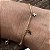 PULSEIRA COM CRUZ BANHADA A OURO 18 K. - Imagem 1