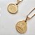 COLAR COM PINGENTE AGNUS DEI BANHADO OURO 18 K - Imagem 1