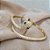 PULSEIRA BRACELETE COBRA COM ZIRCONIAS CRISTAIS BANHADA A OURO 18K - Imagem 2