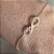 PULSEIRA INFINITO COM ZIRCONIAS BANHADA A OURO 18K - Imagem 1